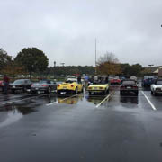 Our Alfas etc. arrive in a damp Patriot Square parking lot